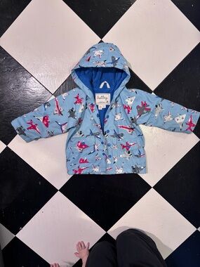 Hatley Light Blue Airplane Hooded Raincoat with terry cloth lining